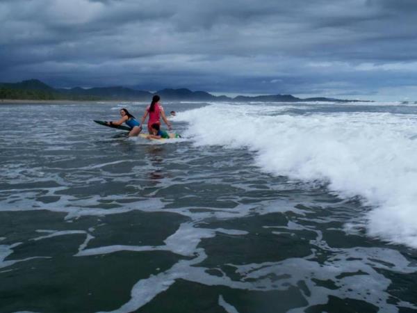 Family volunteering with turtles in Costa Rica