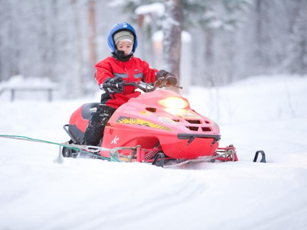 Family winter activity holiday in Finland