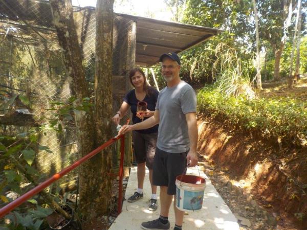 Family volunteering at wildlife rescue centre, Costa Rica
