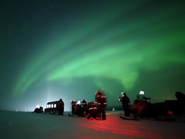 Downhill Skiing and Aurora hunting in Finnish Lapland