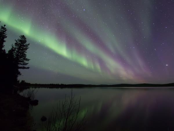 Wilderness auroras holiday during the Finnish Autumn