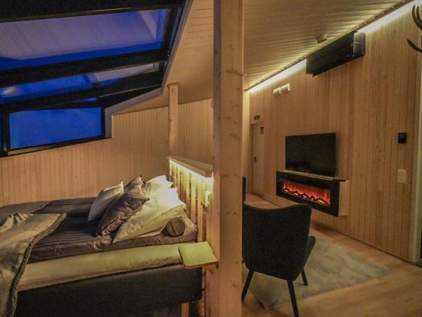 Lapland holiday, husky safari & log cottage