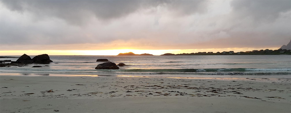 The midnight sun at the beach at Ramberg