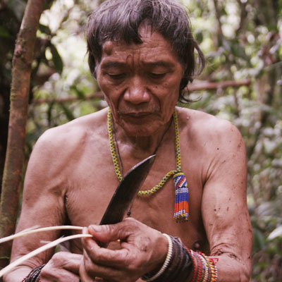 Local tribe with a machete