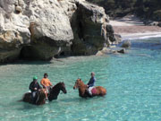 Horses riding in the sea, Menorca. Photo by Audax Hotels