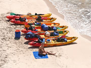 Kayaks on beach in Menorca. Photo by Audax Hotels