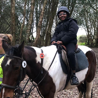 The children riding horses on a previous trip