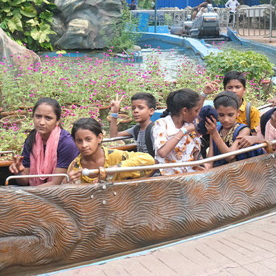 Kids on a log flume at Nicco Amusement park, India