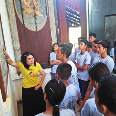 Youth looking at painting